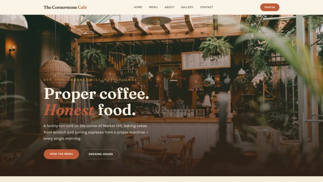 Cornerstone Café homepage — a warm, rustic café site with a hero photo of the coffee bar